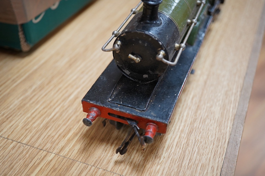 A Bing for Bassett Lowke 0 gauge tinplate clockwork LNER Ivatt 4-4-0 tender locomotive, 4390, together with an early Hornby clockwork 0-4-0, 2710, in GNR green livery with Meccano Ltd roundels to locomotive splasher and